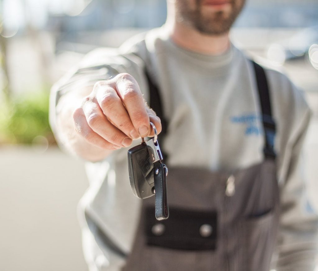 Shallow Focus Car Key held by a Man